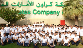 Dubai group photo in front of building